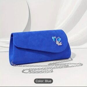 Elegant Blue Clutch with Butterfly Accent